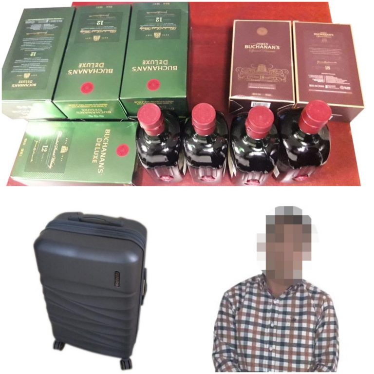 Lo arrestan por sustraer alcohol, con todo y maleta