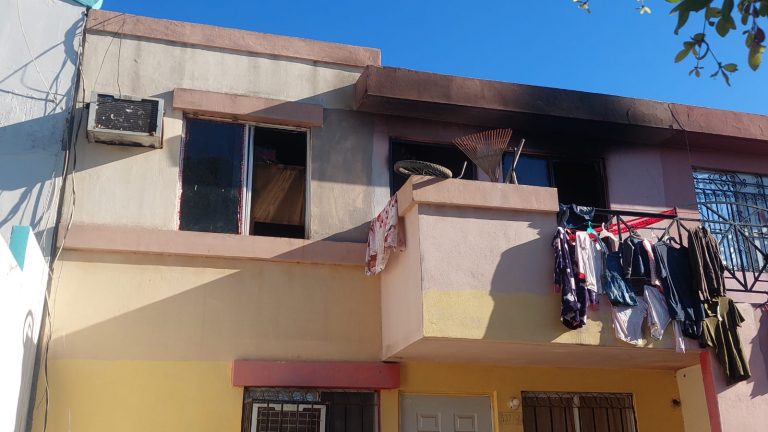 Familia resulta intoxicada en incendio de vivienda