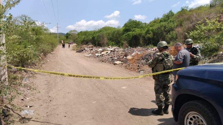 Tenía disparos y una bolsa en la cabeza